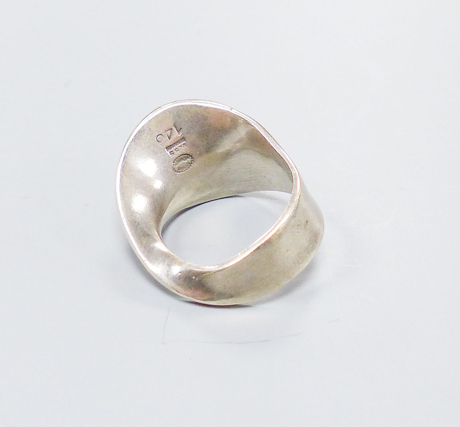 A Georg Jensen sterling ring, no. 148, size O.